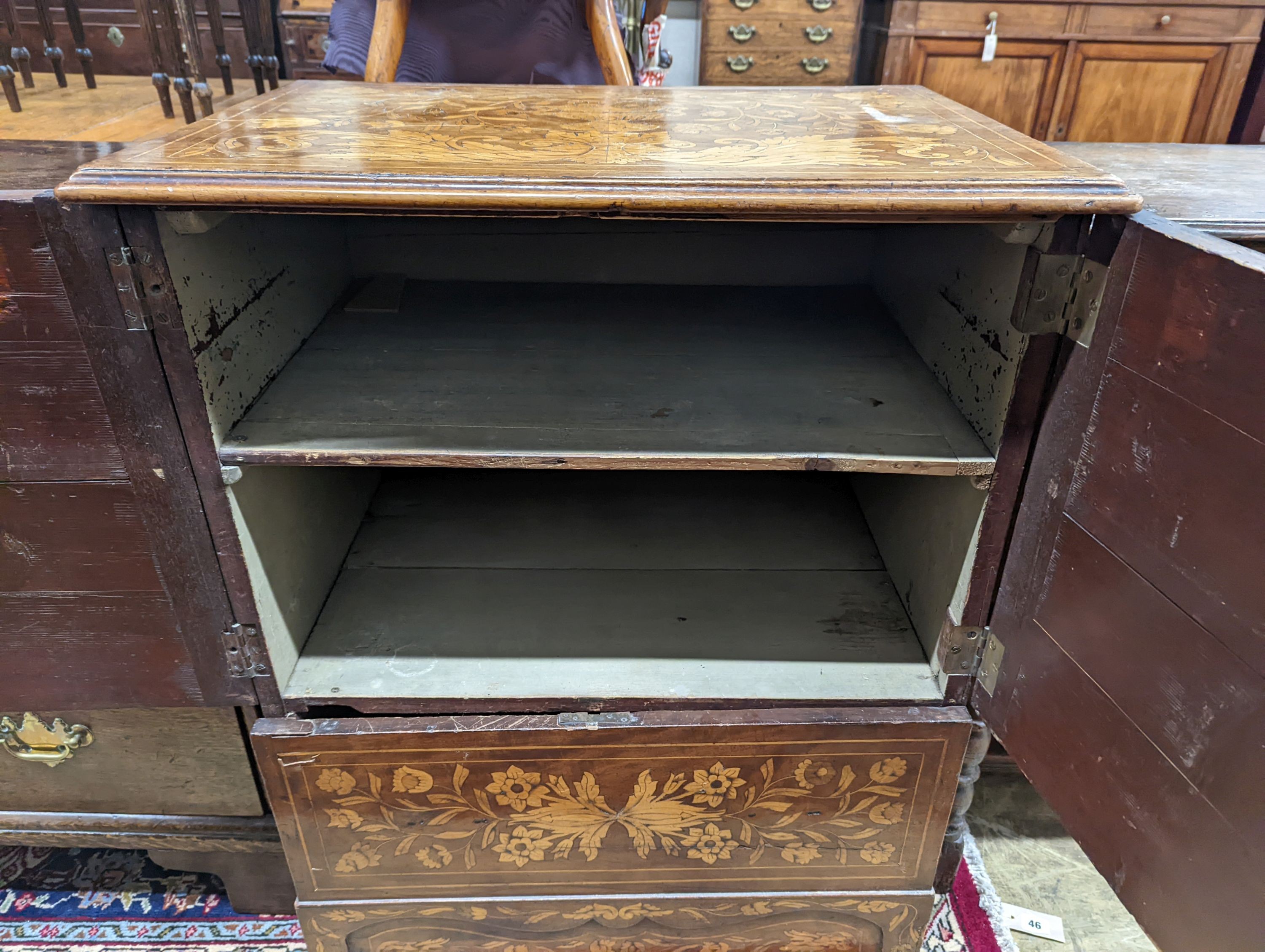 An 18th century Dutch floral marquetry walnut cabinet (altered), width 70cm, depth 48cm, height 87cm